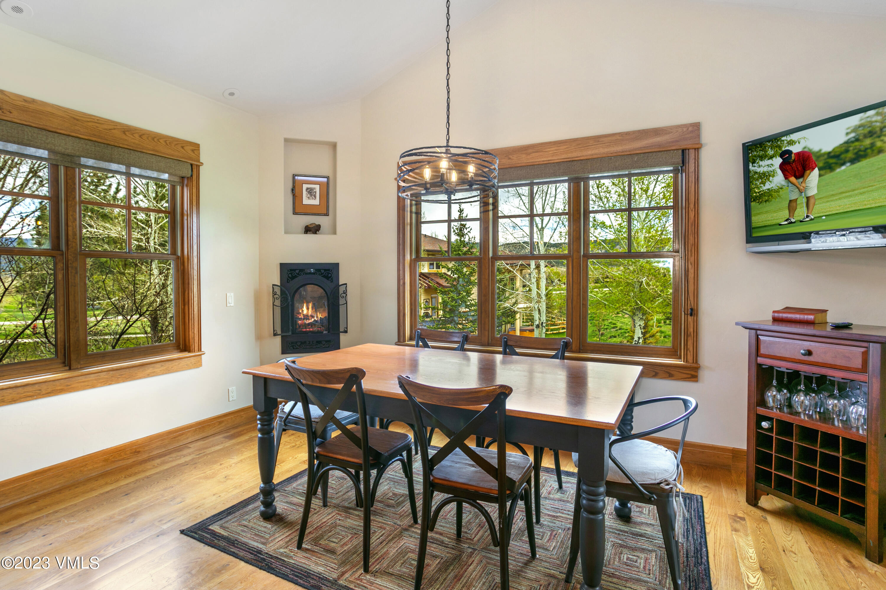 106 East Double Hitch Eagle, CO 81631 - Photo 6 of 28 a view of a dining room with furniture window and wooden floor