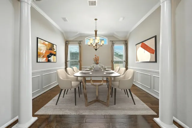 an open kitchen with a refrigerator and a fireplace
