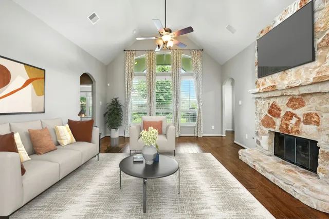 a kitchen with stainless steel appliances granite countertop wooden cabinets a stove top oven a sink and dishwasher