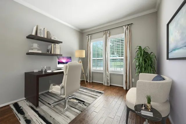 a kitchen with stainless steel appliances granite countertop a refrigerator a sink dishwasher a stove and a refrigerator with wooden floor