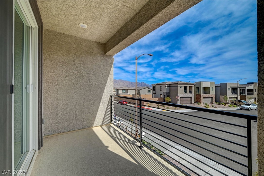 8855 Roadrunner Ravine Street Las Vegas, NV 89166 - Photo 36 of 54 Balcony featuring a residential view
