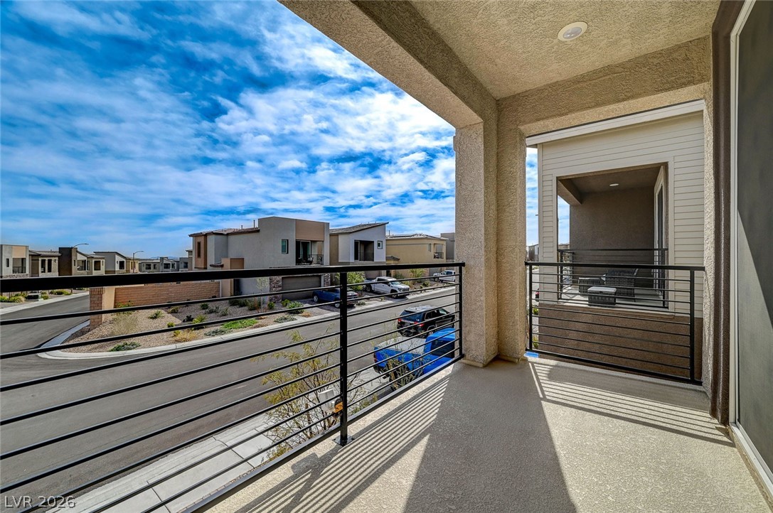 8855 Roadrunner Ravine Street Las Vegas, NV 89166 - Photo 37 of 54 Balcony featuring a residential view