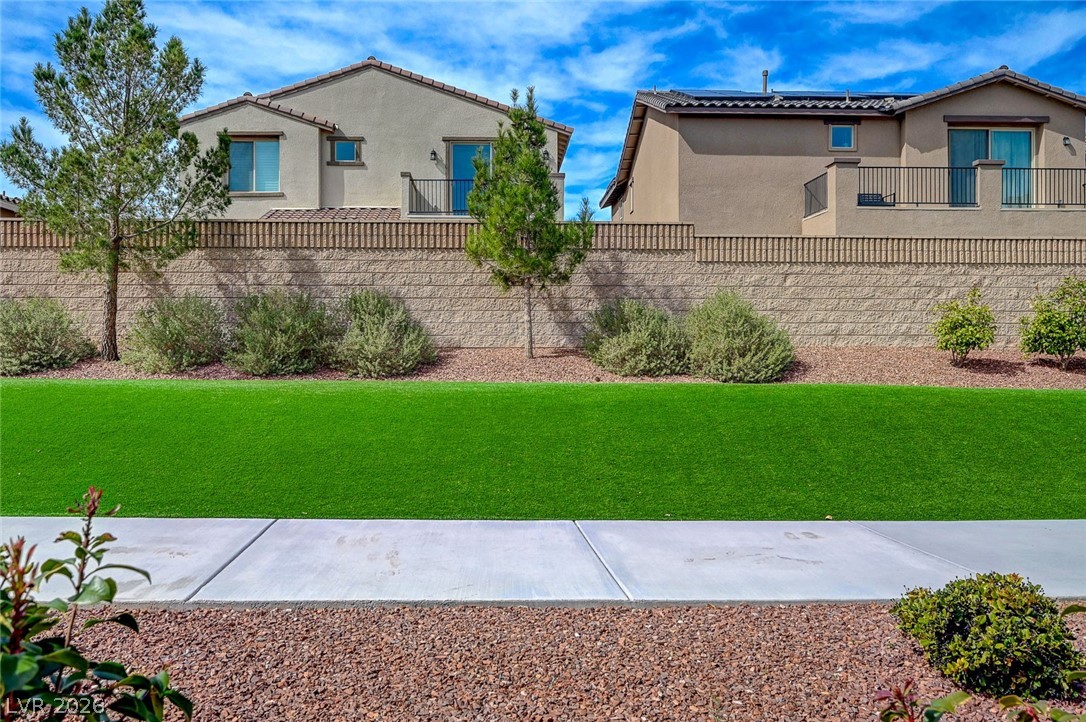 8855 Roadrunner Ravine Street Las Vegas, NV 89166 - Photo 52 of 54 View of yard with fence