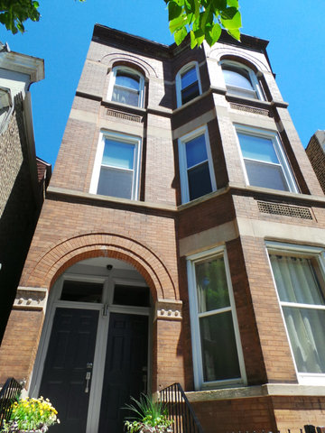 1231 North Artesian Avenue, Unit 2 Chicago, IL 60622 - Photo 1 of 9 a view of a building with a door
