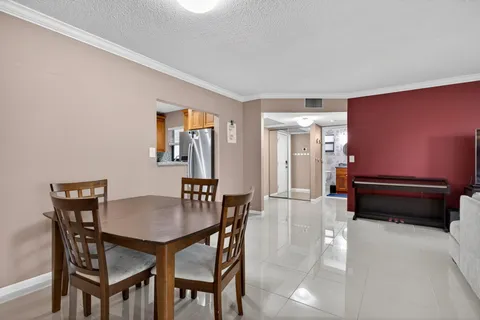 a view of a livingroom with furniture and window