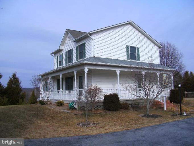 121 Minebank Road Middletown, VA 22645 - Photo 2 of 26 a front view of a house with a yard