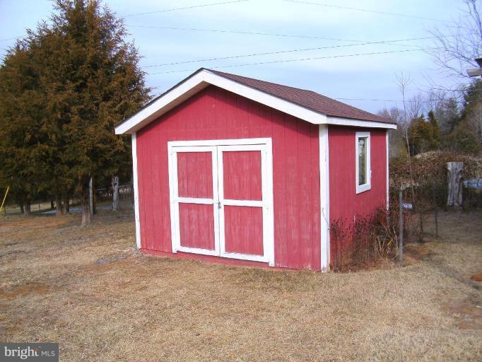 121 Minebank Road Middletown, VA 22645 - Photo 9 of 26 a view of backyard of house
