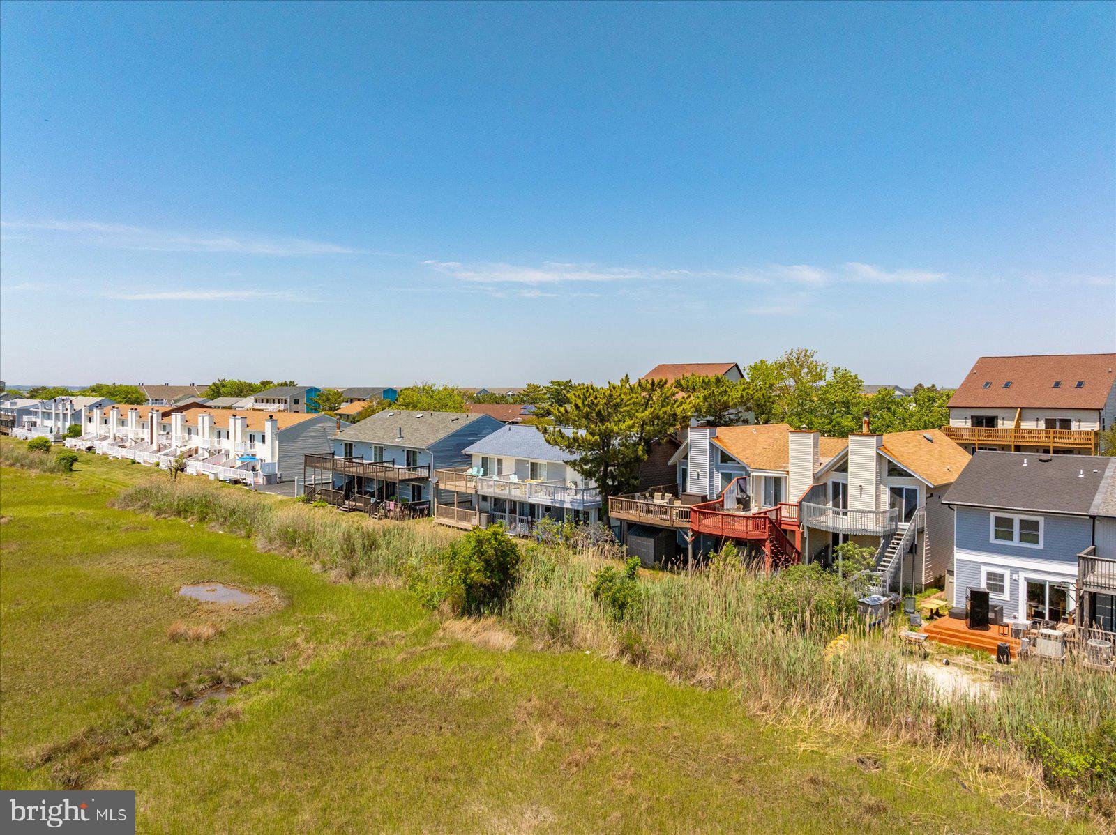 135 Jamestown Road, Unit 18A Ocean City, MD 21842 - Photo 54 of 63 a view of a lake with houses