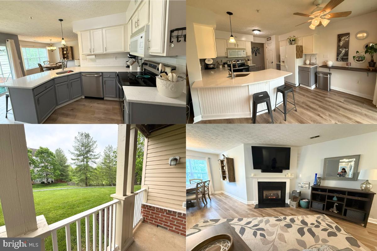 a living room with stainless steel appliances kitchen island furniture and a fireplace