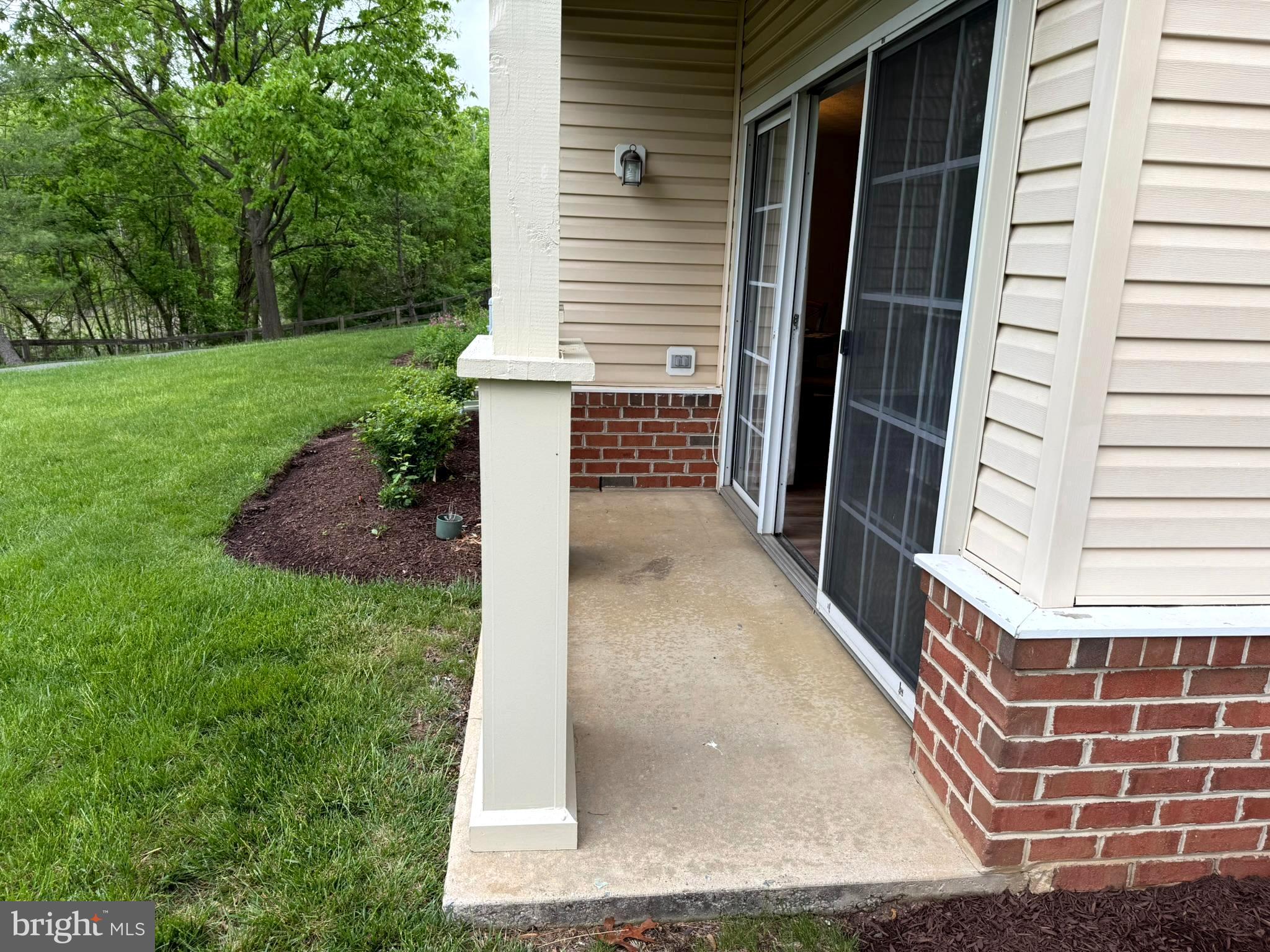 6343 Springwater Terrace, Unit 1012 Frederick, MD 21701 - Photo 15 of 39 a view of a house with a yard