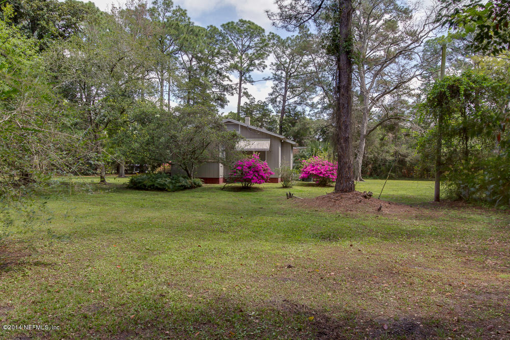 4621 Barnes Road South Jacksonville, FL 32207 - Photo 11 of 29 a view of backyard with green space