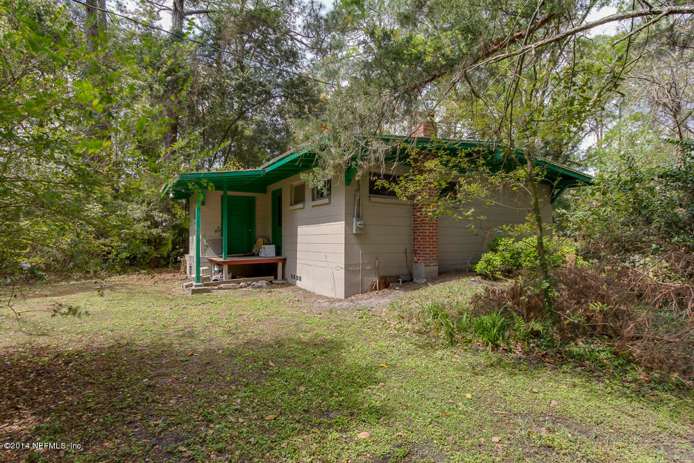 4621 Barnes Road South Jacksonville, FL 32207 - Photo 14 of 29 a view of a house with a yard