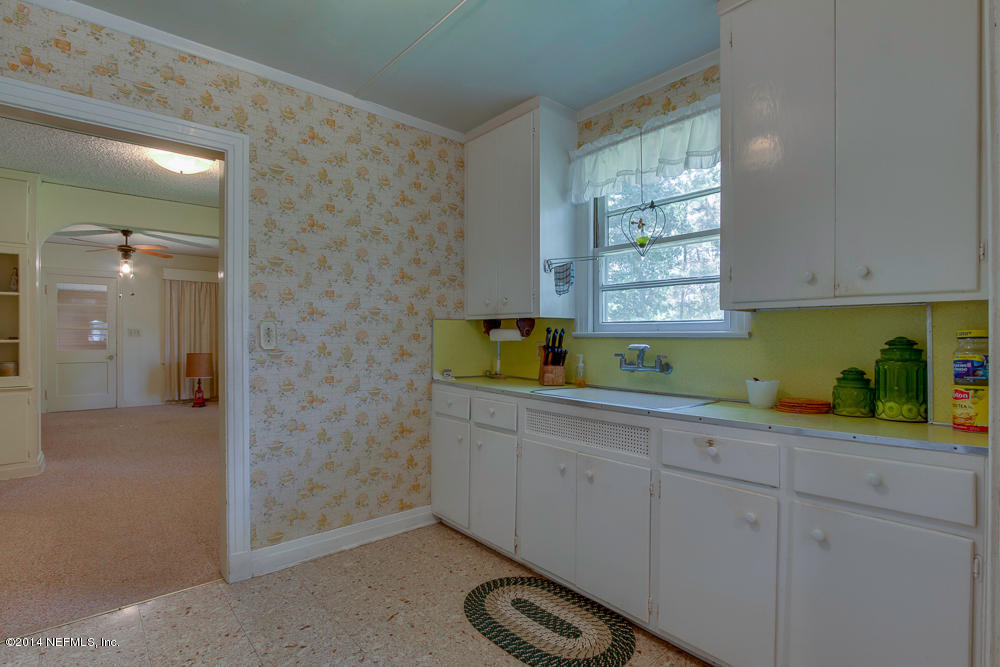 4621 Barnes Road South Jacksonville, FL 32207 - Photo 17 of 29 a kitchen with a sink and a window
