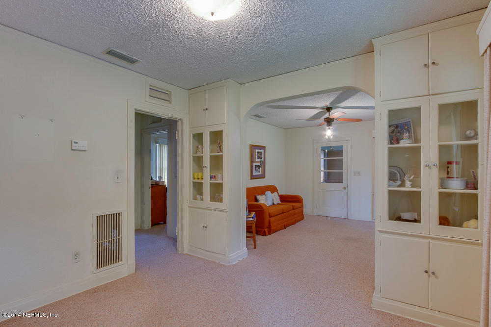 4621 Barnes Road South Jacksonville, FL 32207 - Photo 18 of 29 a view of a livingroom with furniture and cabinet
