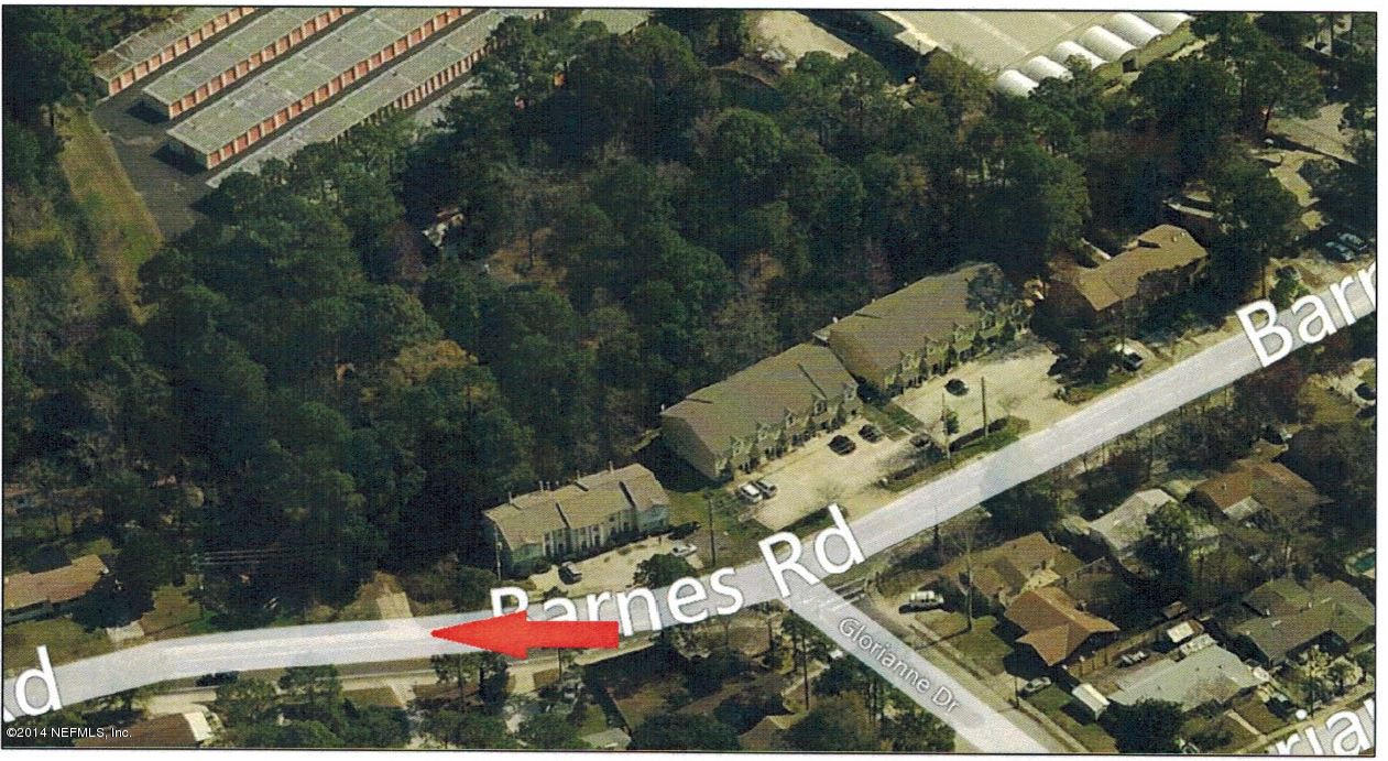 4621 Barnes Road South Jacksonville, FL 32207 - Photo 2 of 29 an aerial view of a house with a yard
