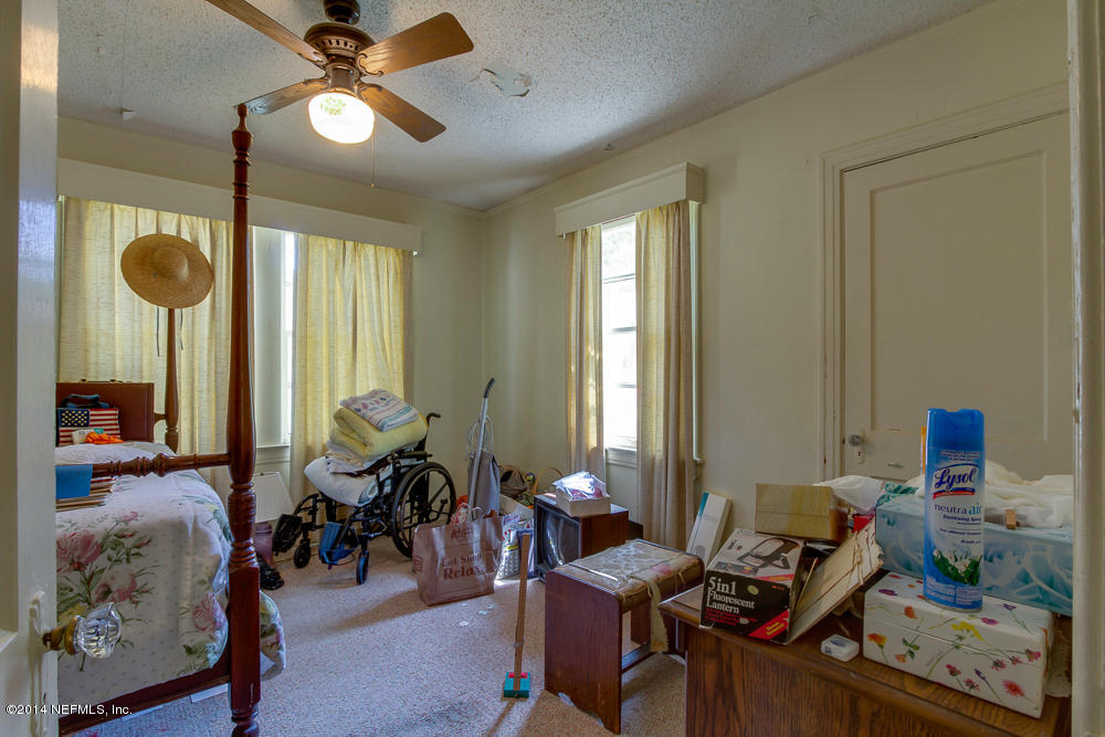 4621 Barnes Road South Jacksonville, FL 32207 - Photo 23 of 29 a living room with furniture and a large window
