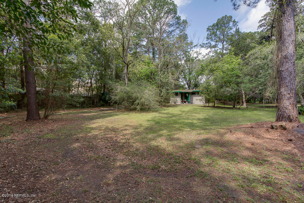 4621 Barnes Road South Jacksonville, FL 32207 - Photo 10 of 29 a view of a house with a yard