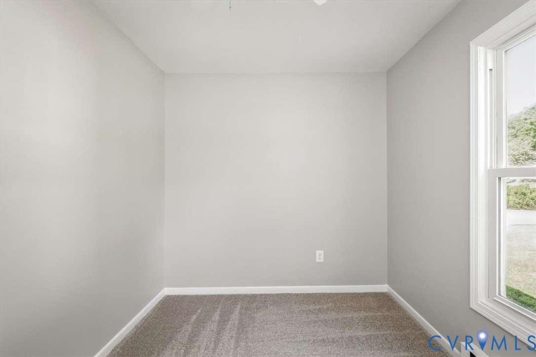 8522 Rainwater Road Richmond, VA 23237 - Photo 12 of 44 Carpeted spare room with baseboards