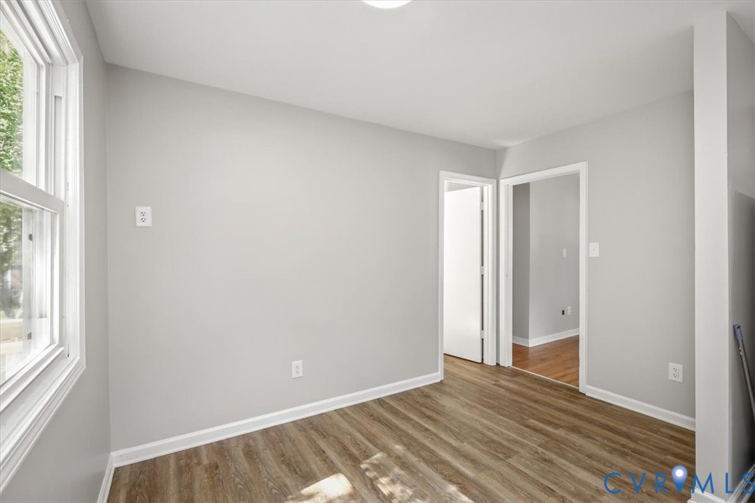8522 Rainwater Road Richmond, VA 23237 - Photo 22 of 44 Unfurnished bedroom featuring multiple windows and