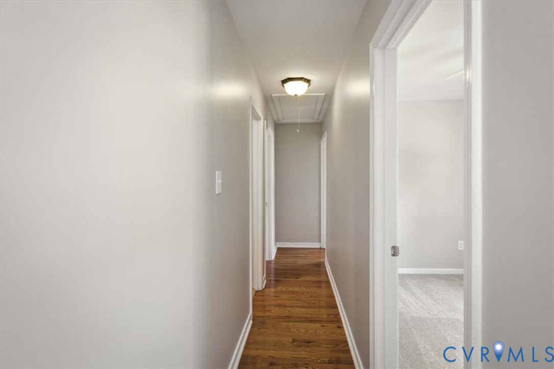 8522 Rainwater Road Richmond, VA 23237 - Photo 26 of 44 Hall featuring attic access and dark wood finished