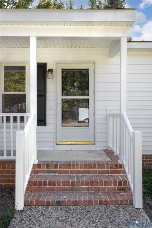 8522 Rainwater Road Richmond, VA 23237 - Photo 3 of 44 View of exterior entry with a porch