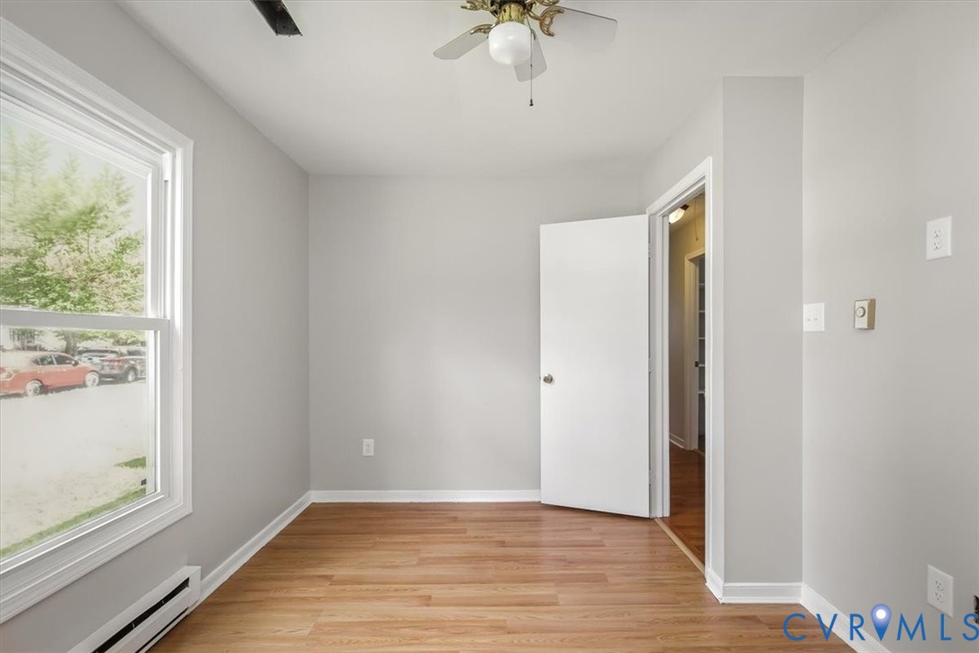 8522 Rainwater Road Richmond, VA 23237 - Photo 38 of 44 Unfurnished room featuring light wood-style floori