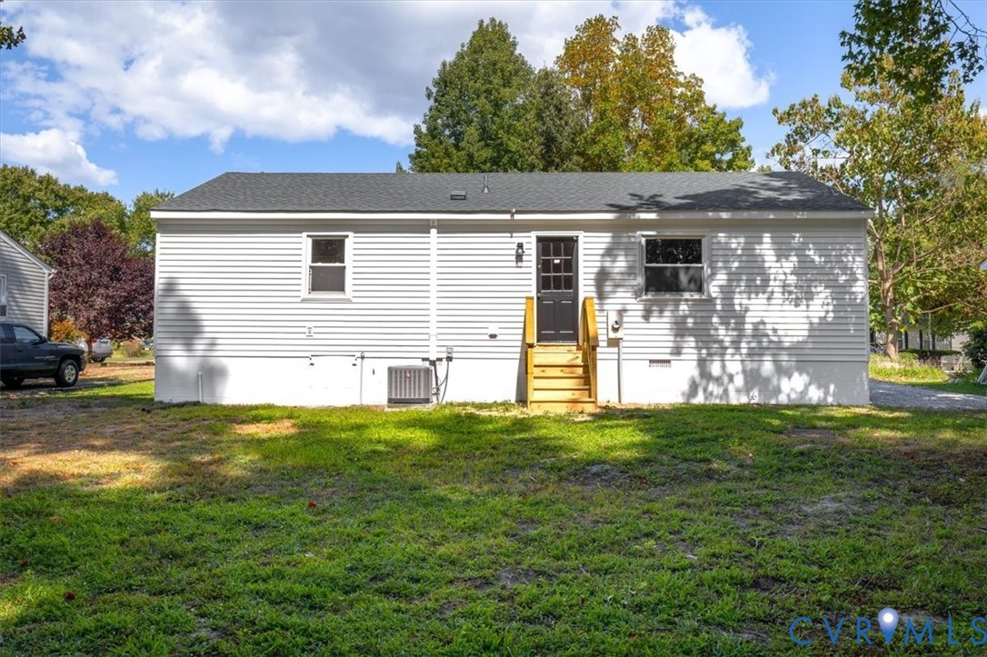 8522 Rainwater Road Richmond, VA 23237 - Photo 43 of 44 Back of house with crawl space, a lawn, and a shin