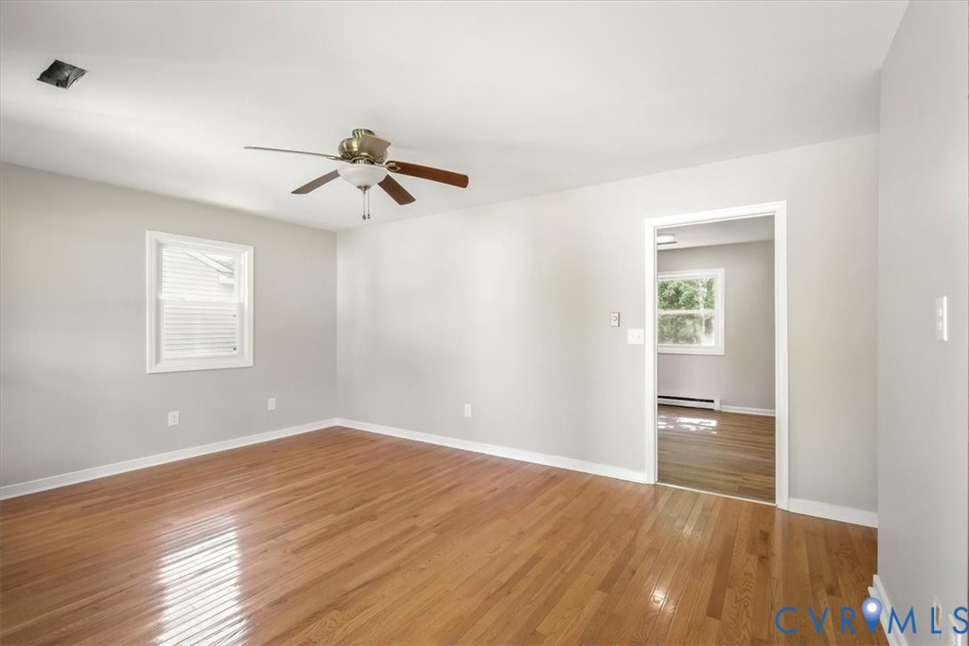 8522 Rainwater Road Richmond, VA 23237 - Photo 6 of 44 Spare room with light wood-style flooring, a ceili