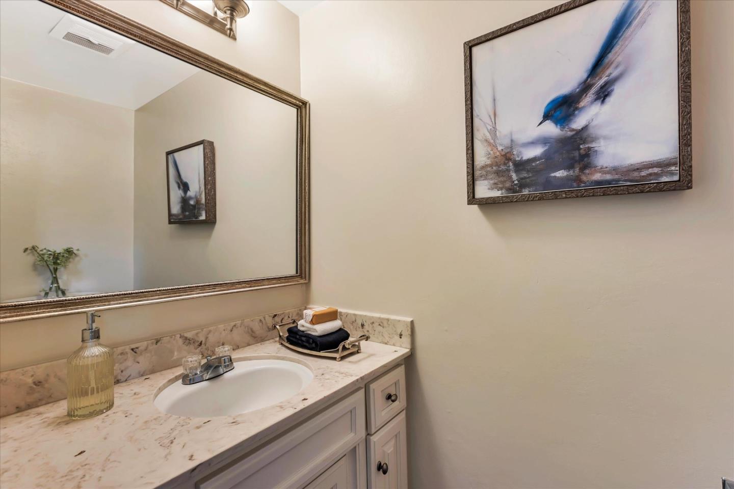 18400 Overlook Road, Unit 35 Los Gatos, CA 95030 - Photo 11 of 28 a bathroom with a sink and a mirror