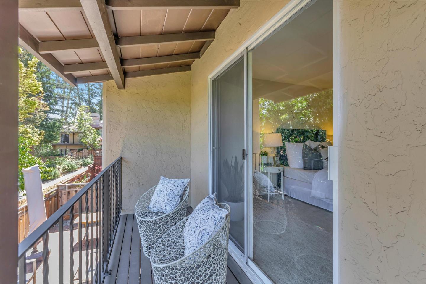 18400 Overlook Road, Unit 35 Los Gatos, CA 95030 - Photo 20 of 28 a balcony with furniture and a gate