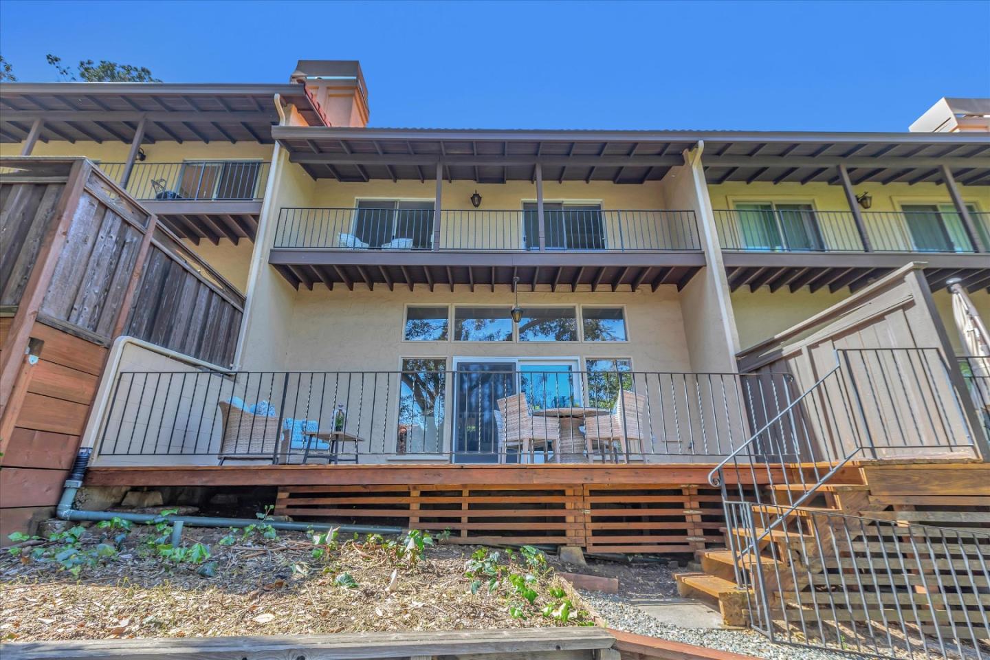 18400 Overlook Road, Unit 35 Los Gatos, CA 95030 - Photo 22 of 28 a front view of a house with a deck