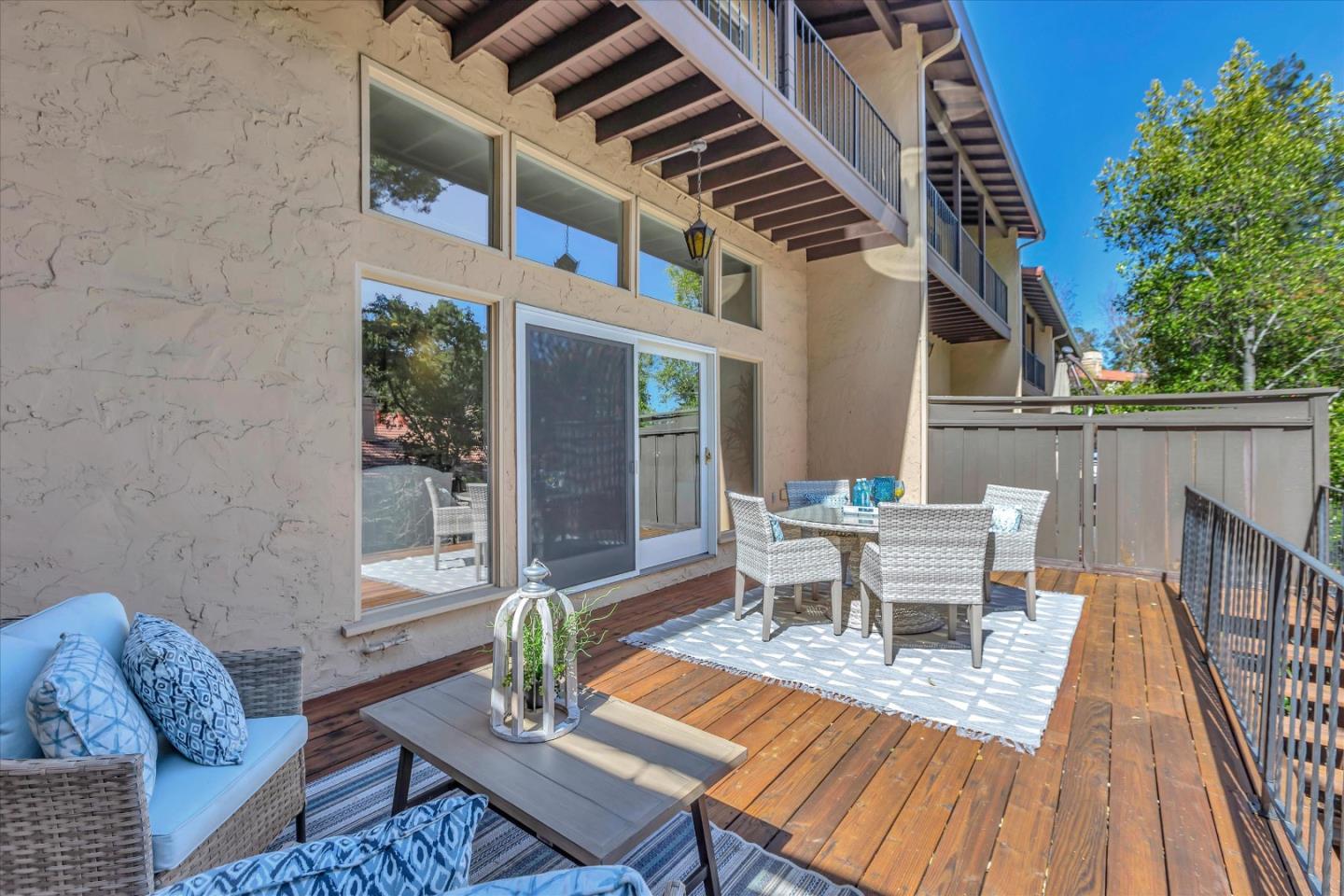 18400 Overlook Road, Unit 35 Los Gatos, CA 95030 - Photo 23 of 28 a balcony with furniture and wooden floor