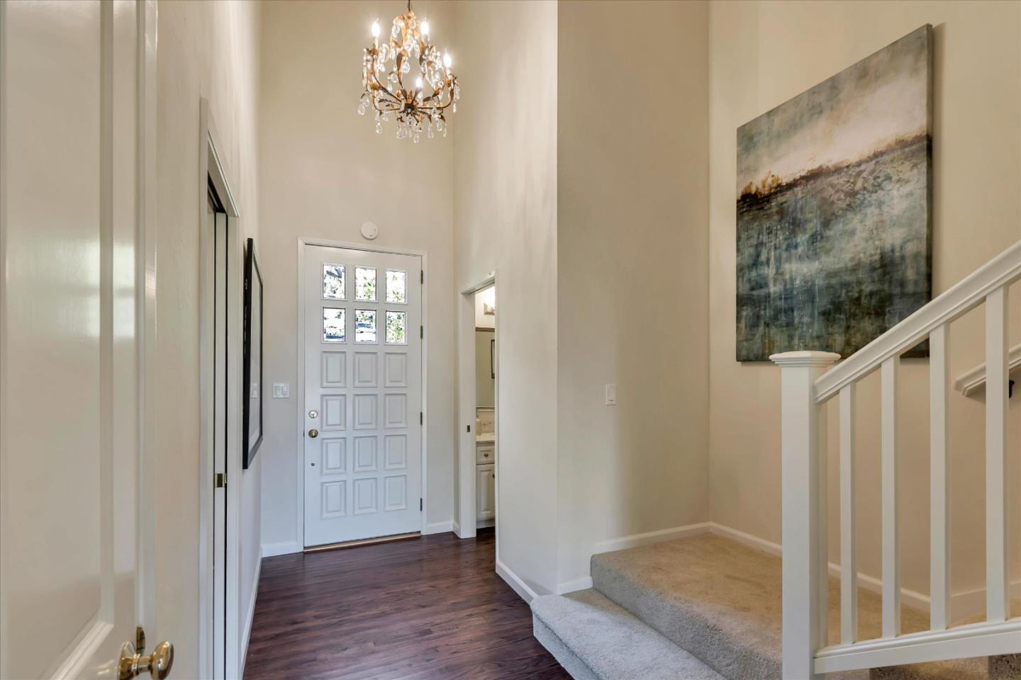 18400 Overlook Road, Unit 35 Los Gatos, CA 95030 - Photo 3 of 28 a view of a hallway with wooden floor and staircase