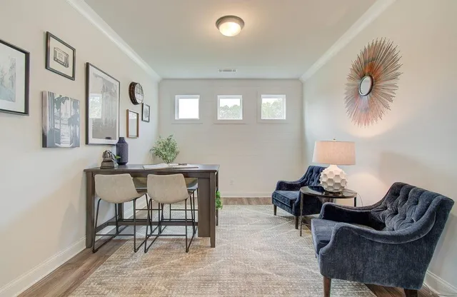 a view of a livingroom with furniture and a couch