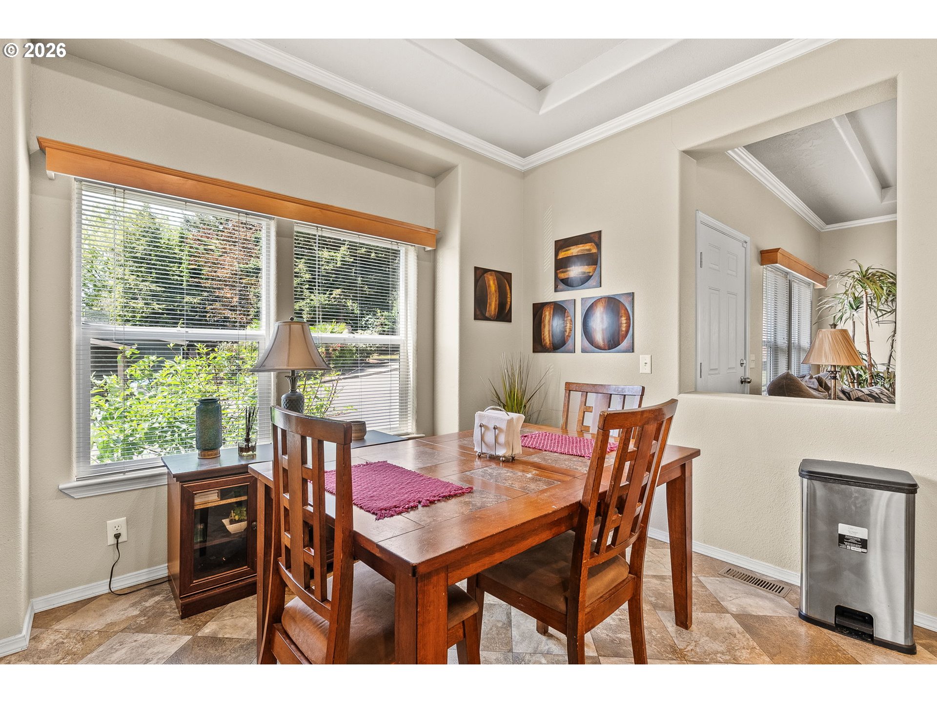 13620 Southwest Beef Bend Road, Unit 1 Portland, OR 97224 - Photo 16 of 34 a dining room with furniture and window
