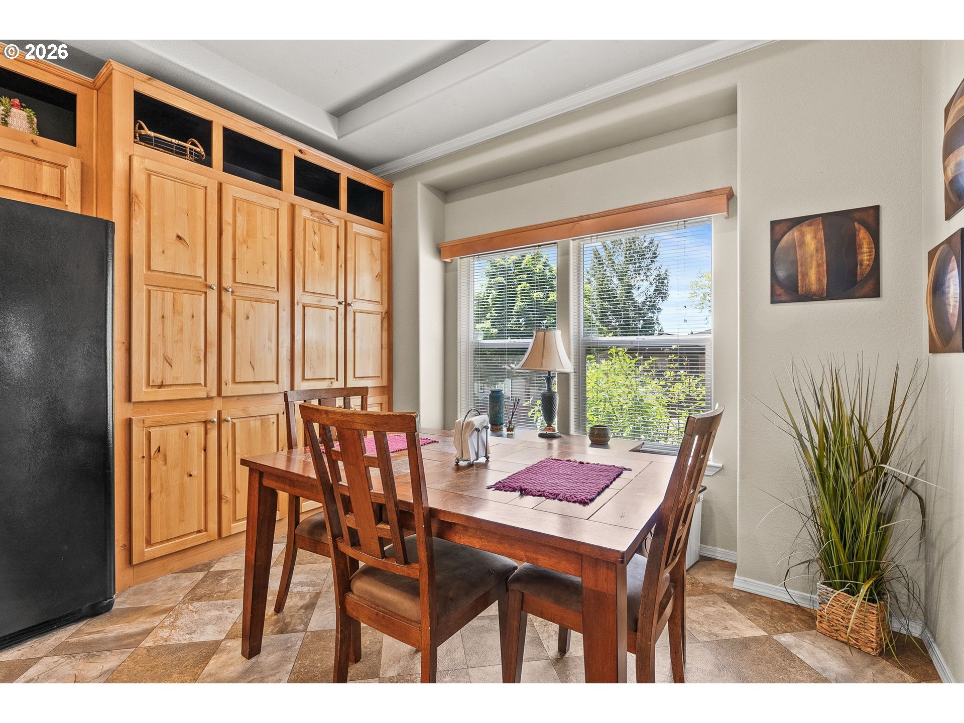 13620 Southwest Beef Bend Road, Unit 1 Portland, OR 97224 - Photo 17 of 34 a view of a dining room with furniture window and outside view