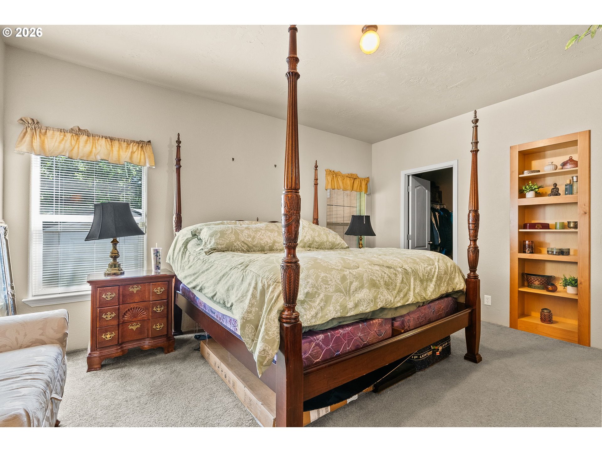 13620 Southwest Beef Bend Road, Unit 1 Portland, OR 97224 - Photo 22 of 34 a bed room with a bed and a closet