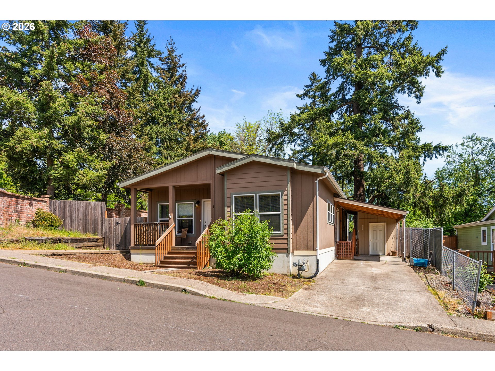 13620 Southwest Beef Bend Road, Unit 1 Portland, OR 97224 - Photo 3 of 34 a view of a house with backyard and sitting area