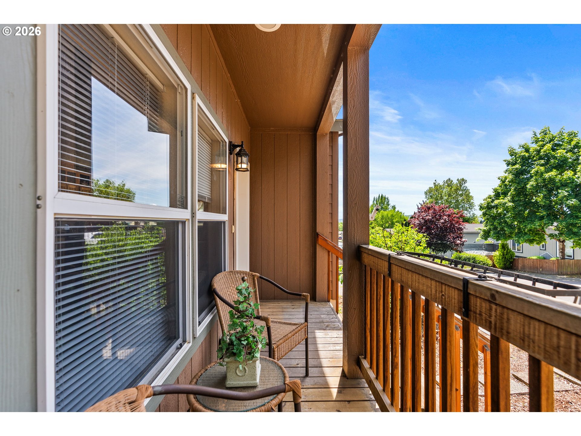 13620 Southwest Beef Bend Road, Unit 1 Portland, OR 97224 - Photo 6 of 34 a view of balcony with wooden floor