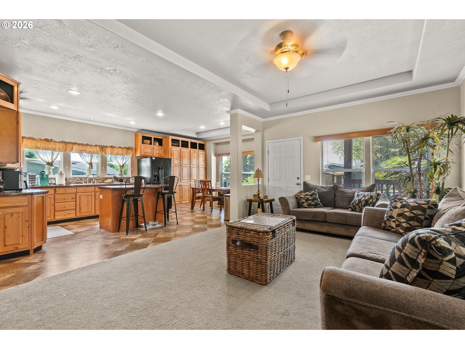 13620 Southwest Beef Bend Road, Unit 1 Portland, OR 97224 - Photo 9 of 34 a living room with furniture and a view of kitchen
