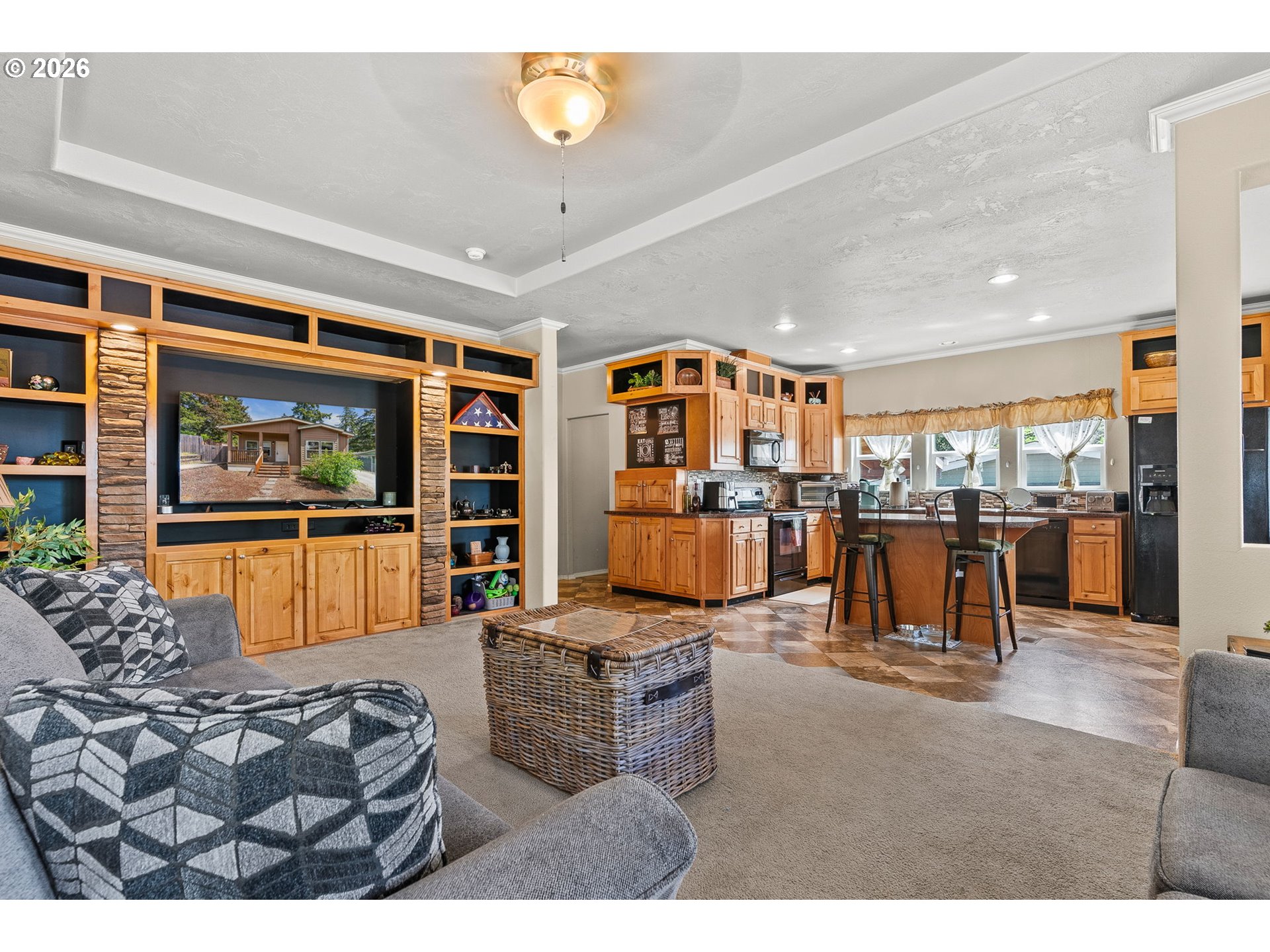 13620 Southwest Beef Bend Road, Unit 1 Portland, OR 97224 - Photo 10 of 34 a living room with furniture and kitchen view
