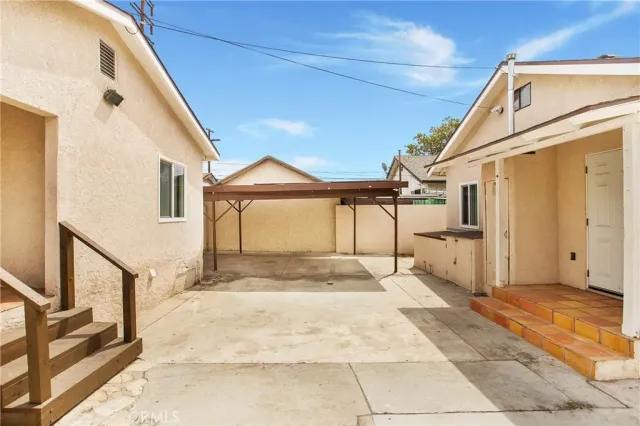 a view of a house with a stairs and a window