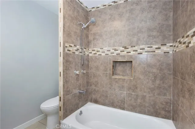 a bathroom with a sink vanity and a mirror