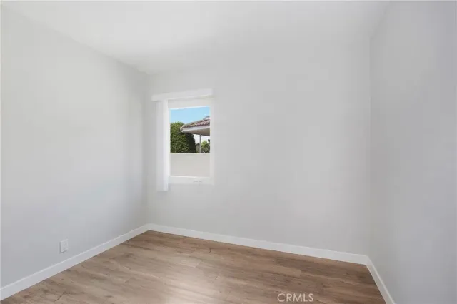 a view of small space with wooden floor
