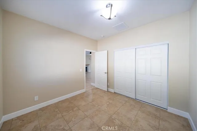 an empty room with fan