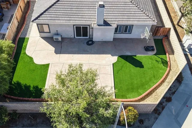 an outdoor view of garden with patio