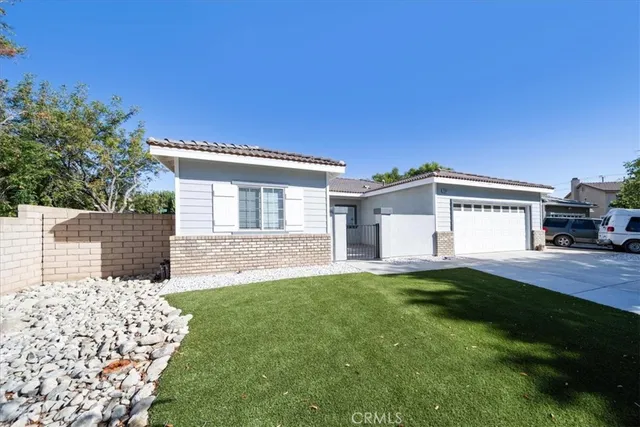 a house view with a garden space