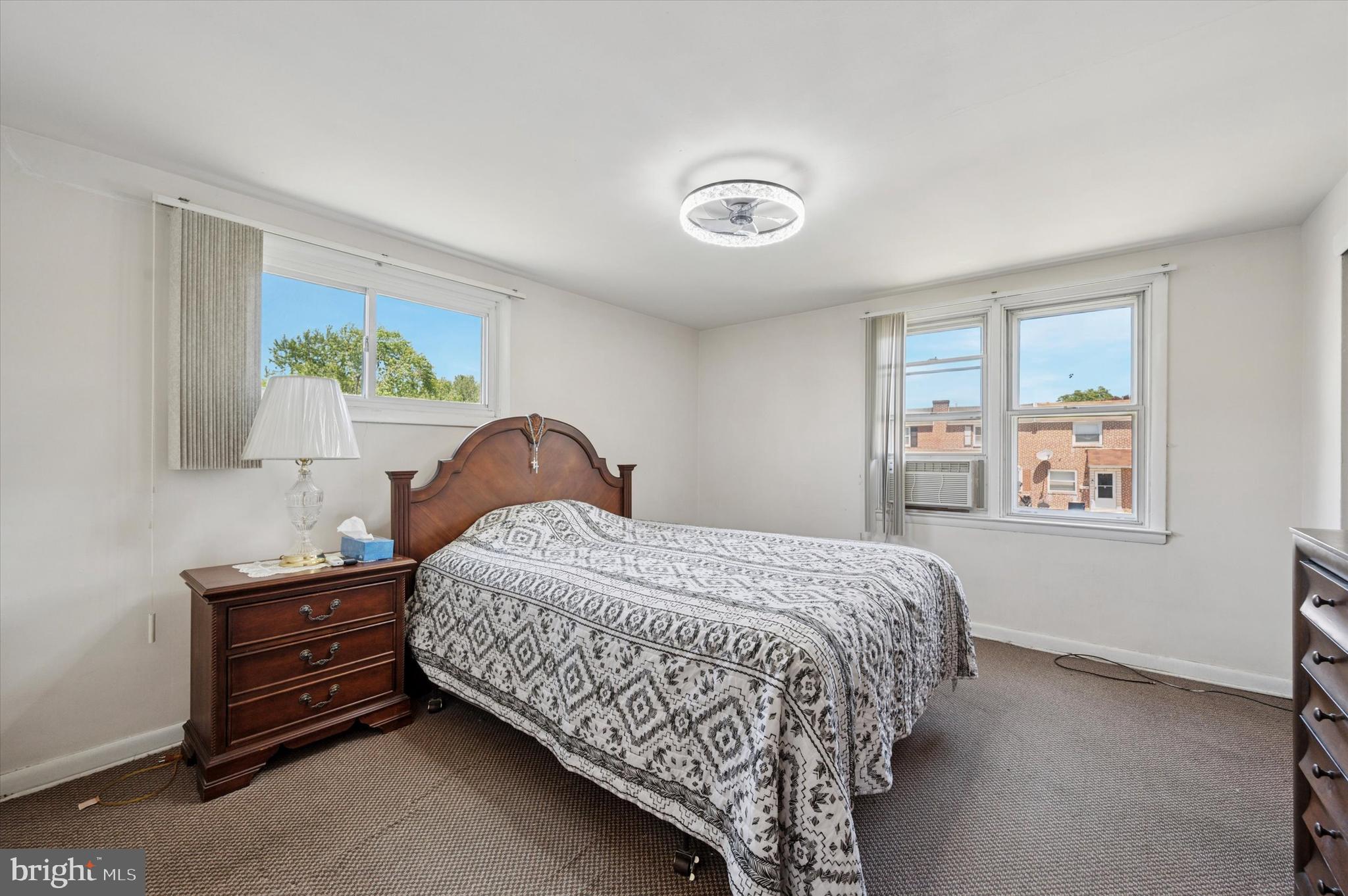 1935 Carter Road Folcroft, PA 19032 - Photo 13 of 15 a bedroom with a bed and a window
