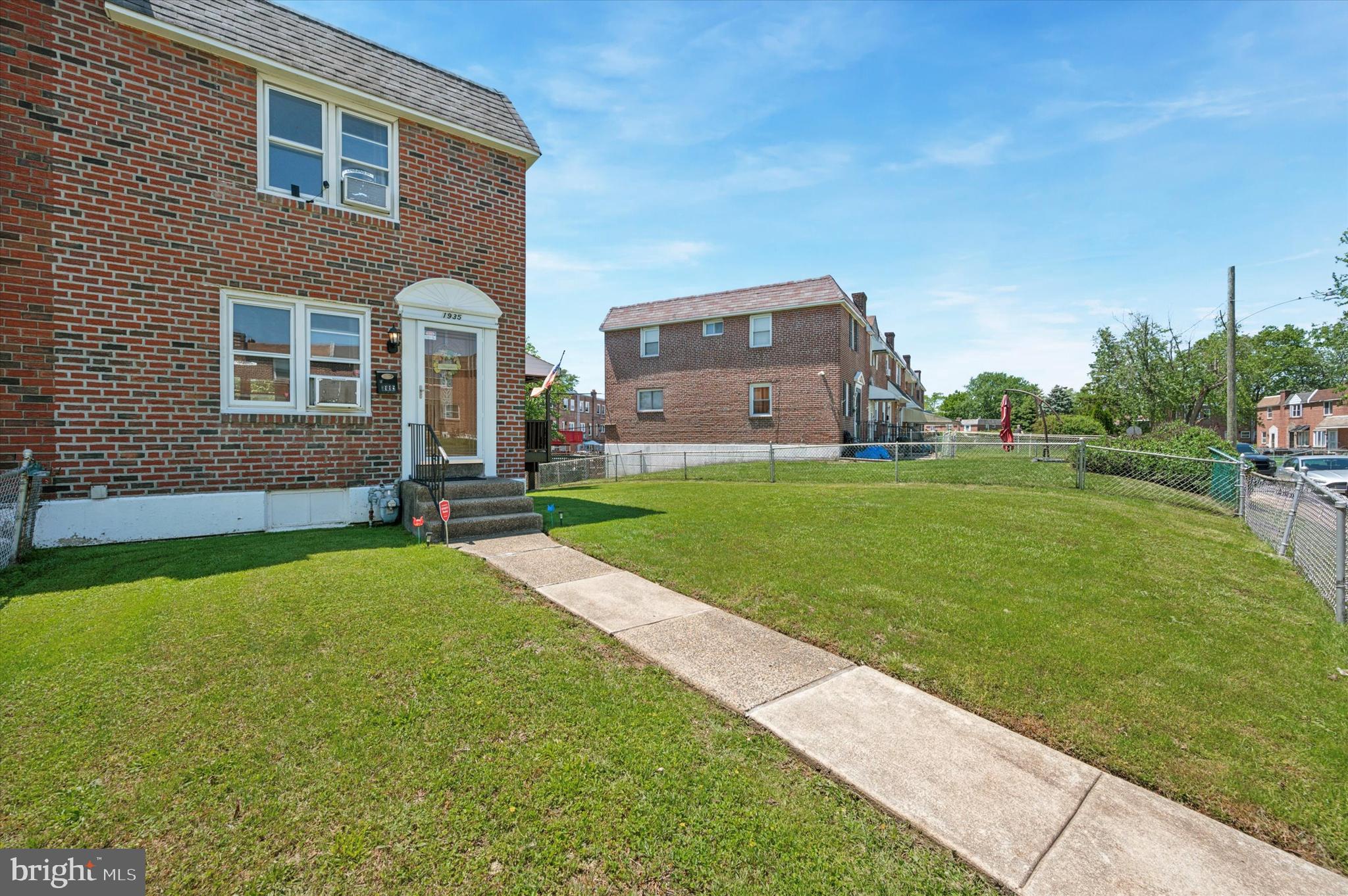 1935 Carter Road Folcroft, PA 19032 - Photo 2 of 15 a front view of a house with a yard