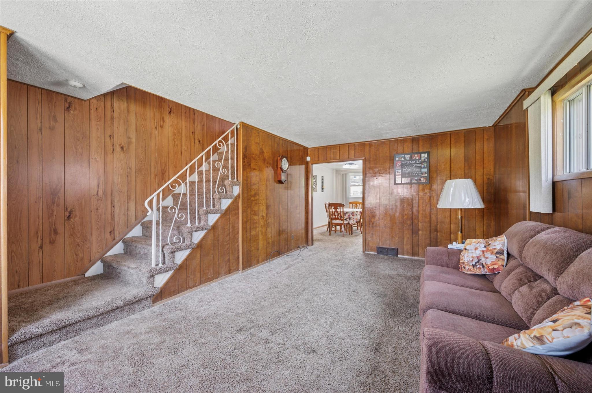 1935 Carter Road Folcroft, PA 19032 - Photo 5 of 15 a view of livingroom with furniture and stairs